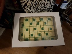 Chess board. White and yellow cake with butter cream frosting