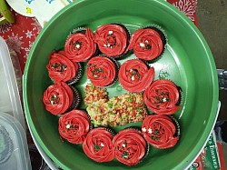 Chocolate confetti cupcakes w/a couple christmas rice krispie treats